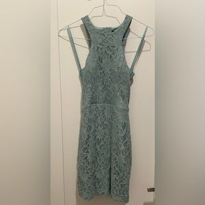 A mini green shimmery lace City Studio dress- very hot!